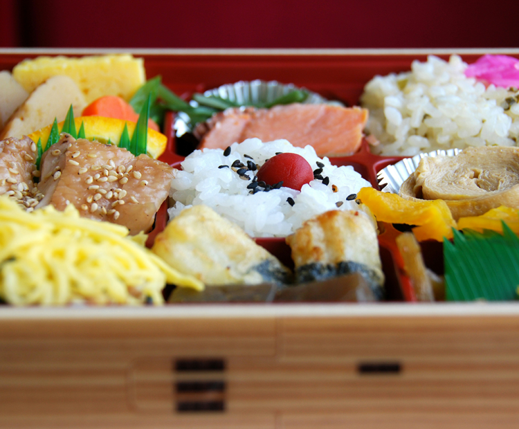 Japanese bento box full of food.